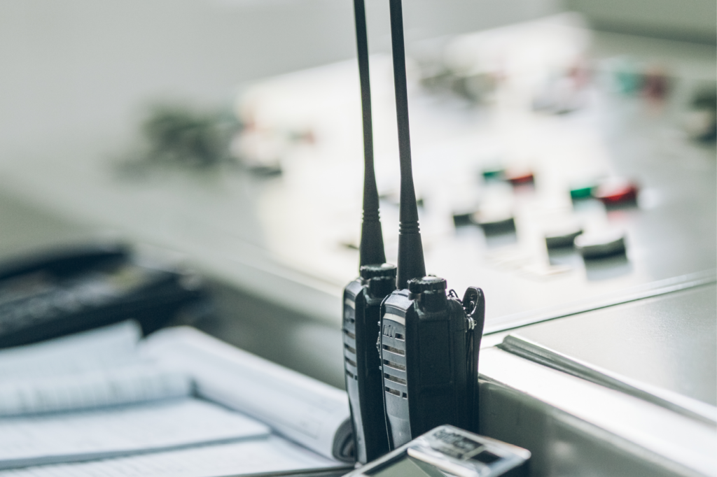 Technician performing marine VHF radio survey for vessel safety at sea